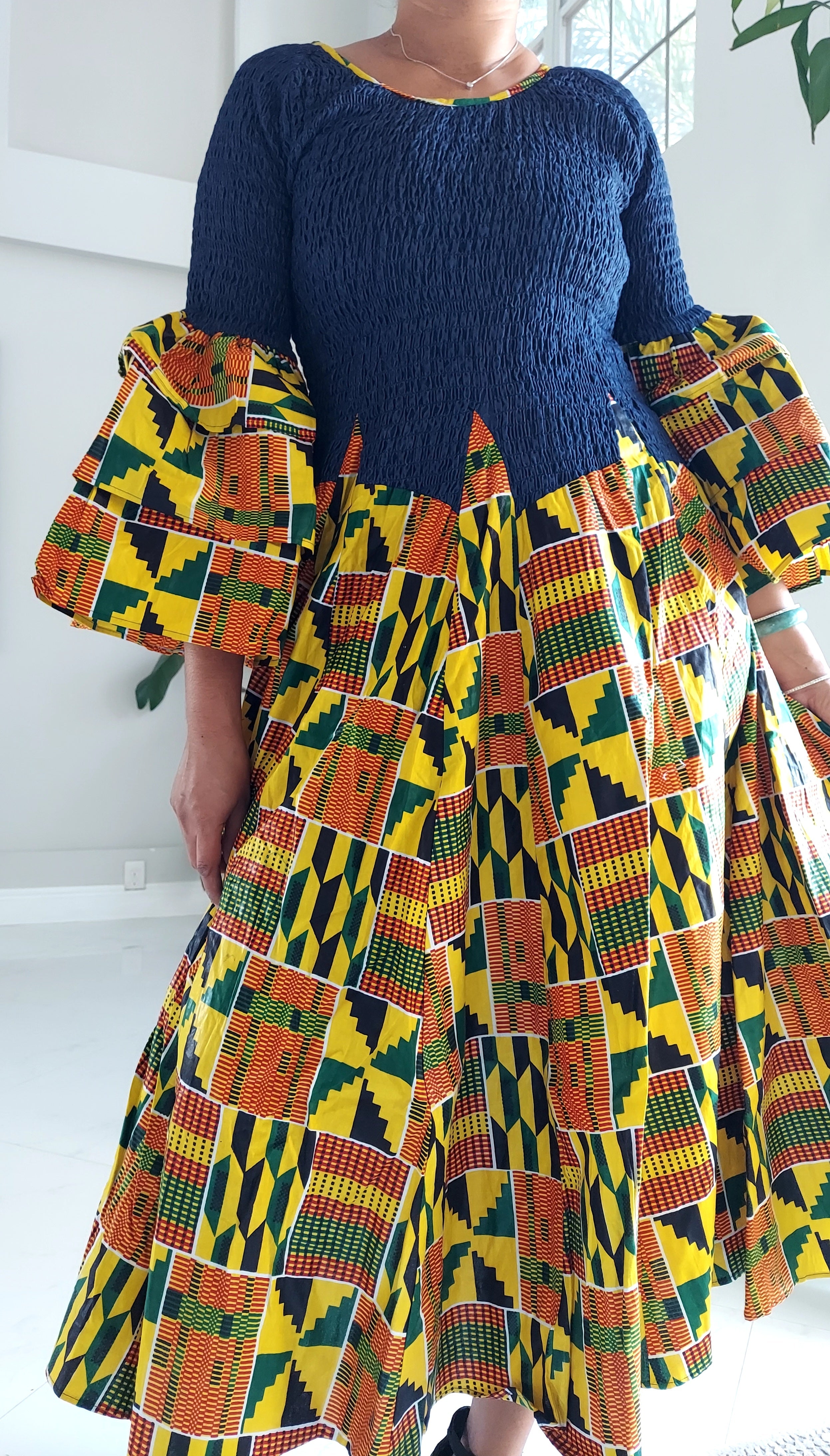 76- Women Long Smocked/ Flared Dress