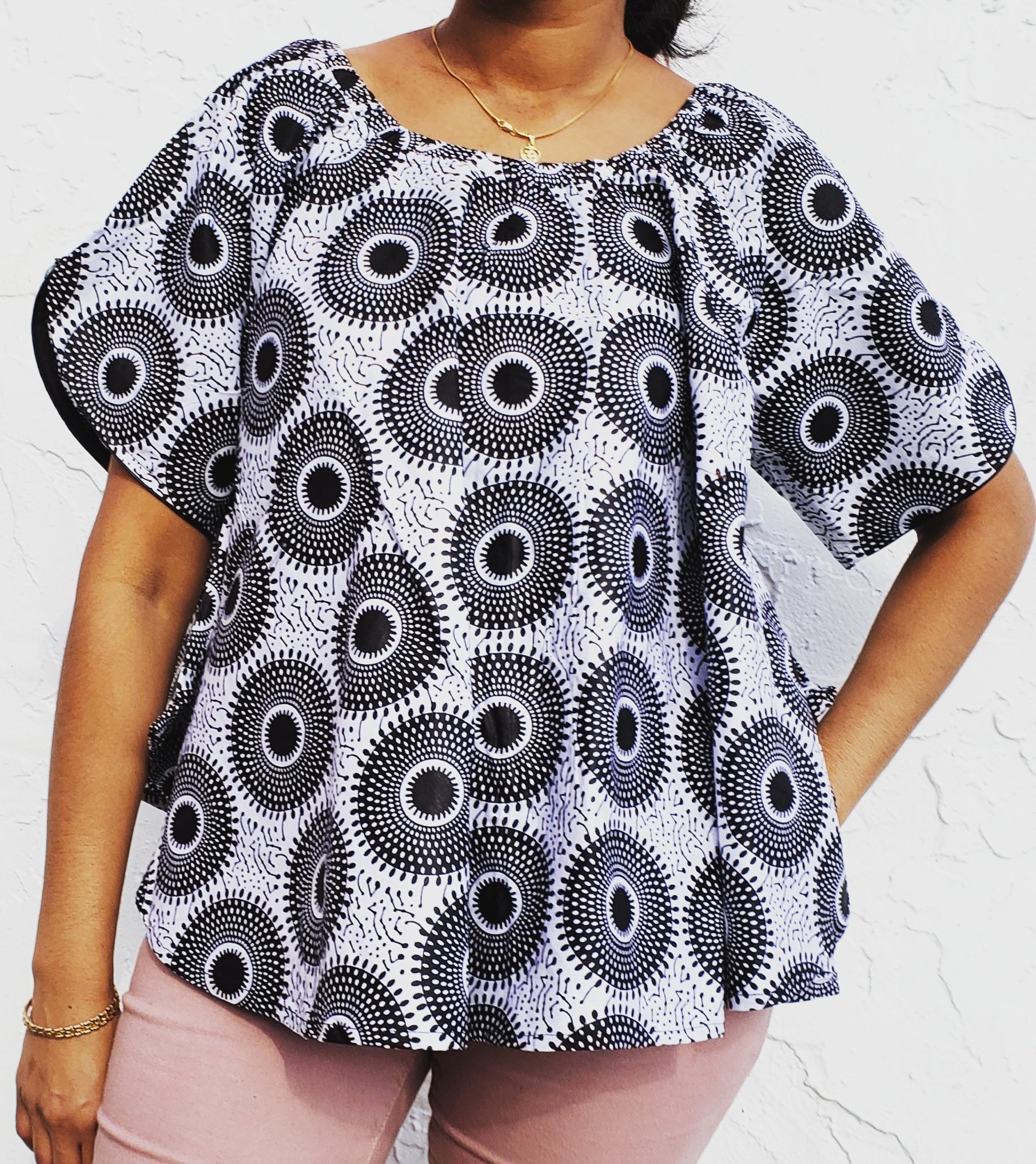 #7049- Authentic African print bell blouse